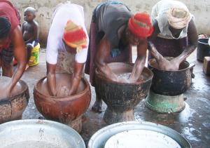 Burkino Faso women extracting shea butter